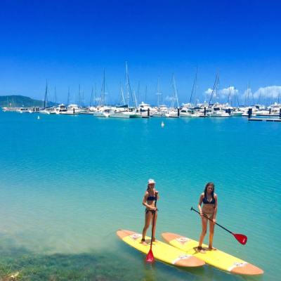 two girls on SUPs at the Whitsundays
