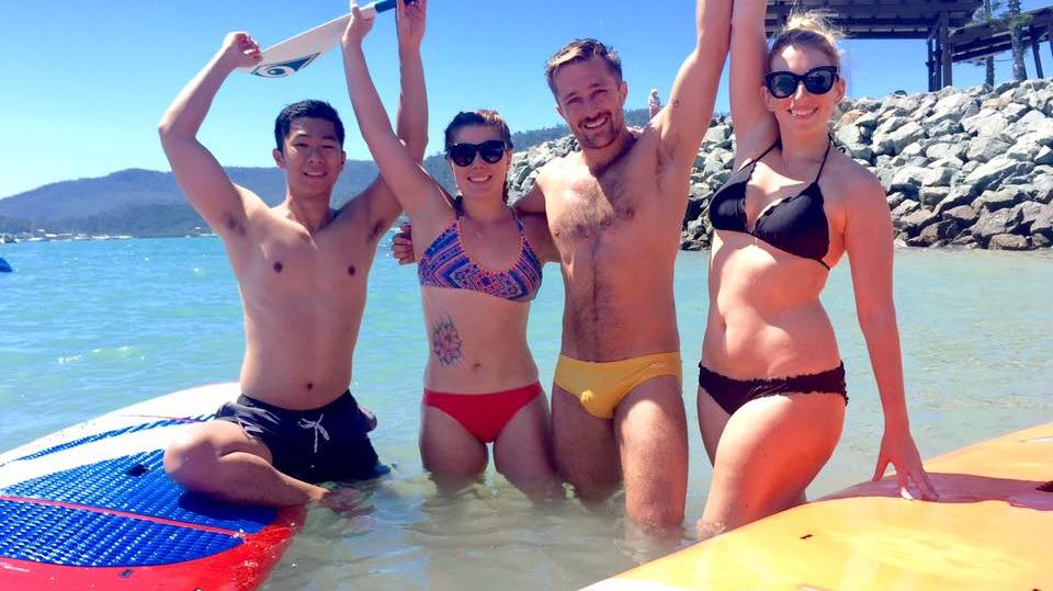 A group enjoying SUP at the Whitsundays