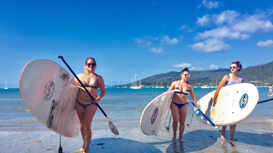 Three girls and SUPs at Airlie Beach