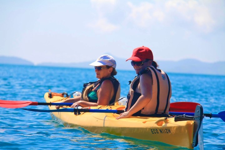 a small boat in a body of water